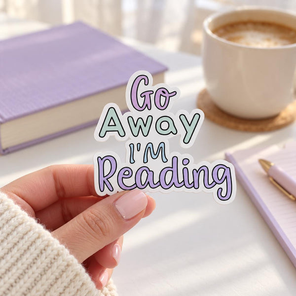 Go Away I'm Reading die-cut sticker with pastel purple and teal lettering — photo 5