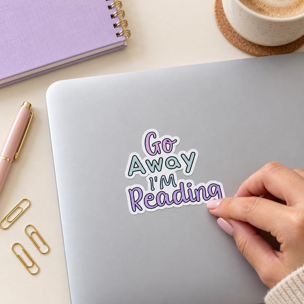 Go Away I'm Reading die-cut sticker with pastel purple and teal lettering — photo 6