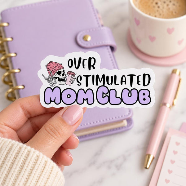 Over Stimulated Mom Club die-cut sticker with a skull, pink flower and purple bubble lettering (view 5)
