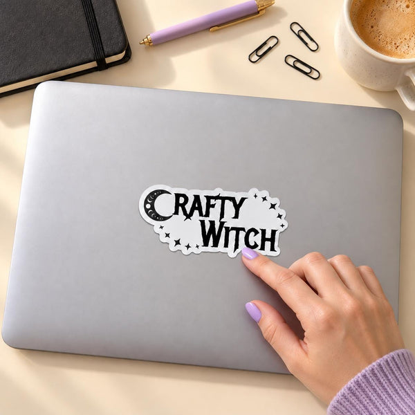 Crafty Witch die-cut sticker with black gothic lettering, crescent moon and stars (view 2)