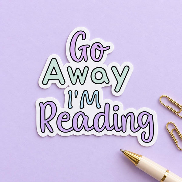 Go Away I'm Reading die-cut sticker with pastel purple and teal lettering — photo 4